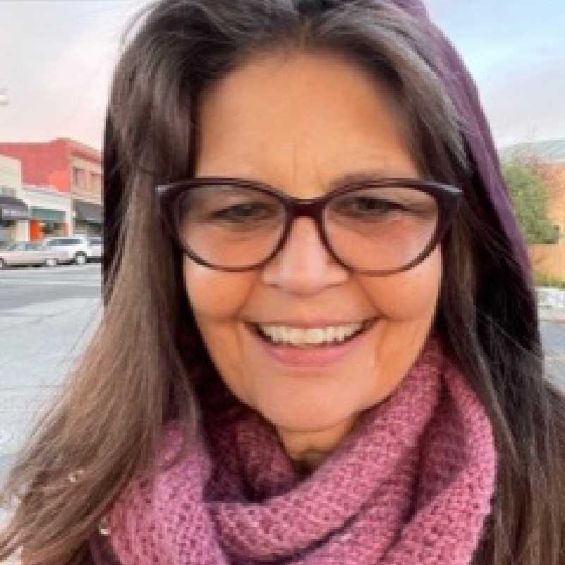 Portrait of Dr. Caprice D. Haverty, PhD — Founder, Group Facilitator, and Chief Advisor at CORR